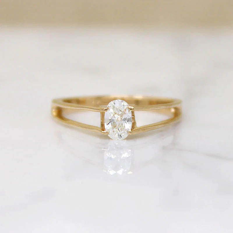 Cubic Zirconia Rings -Oval Diamond in Architectural Gold Solitaire Ring