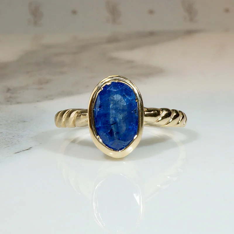 Special Event Rings -Royal Blue 1.25ct Sapphire & Gold Bezel Solitaire Ring