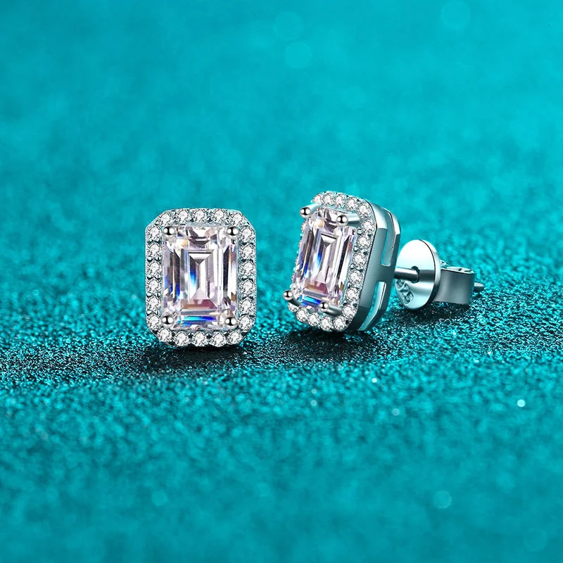 A Pair of 2 Karat/Single 1 Karat (Emerald Cut)